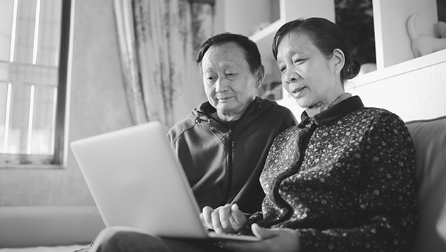 couple looking at tablet