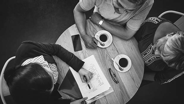 couple meeting with funeral home partner