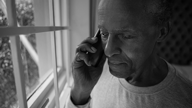 man holding cell phone