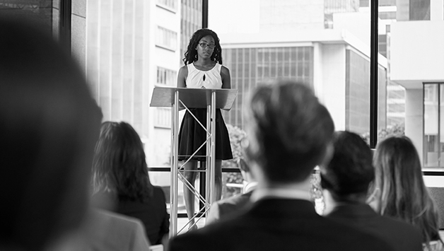 woman giving eulogy