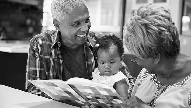 grandparents playing with grandchild