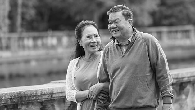 couple walking through park