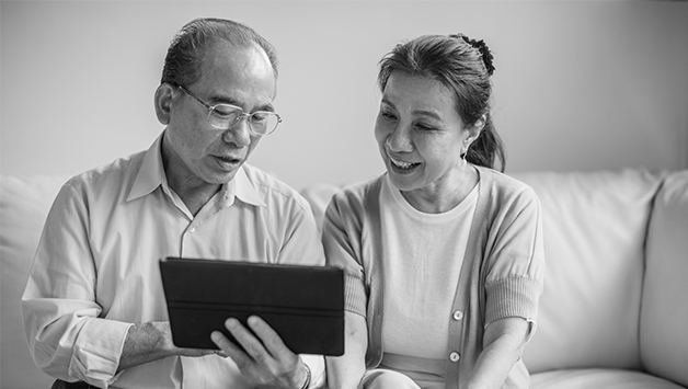 couple looking at tablet