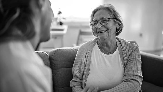 woman talking with adult daughter