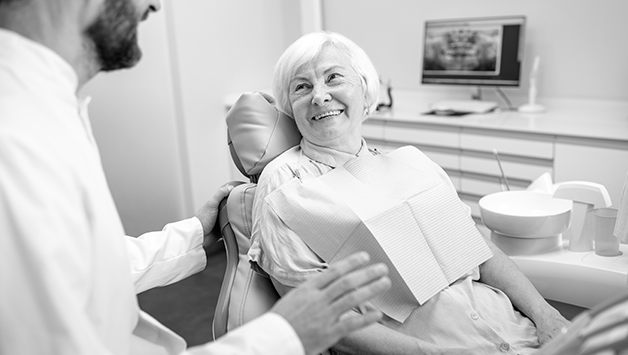 dentist talking to dental patient