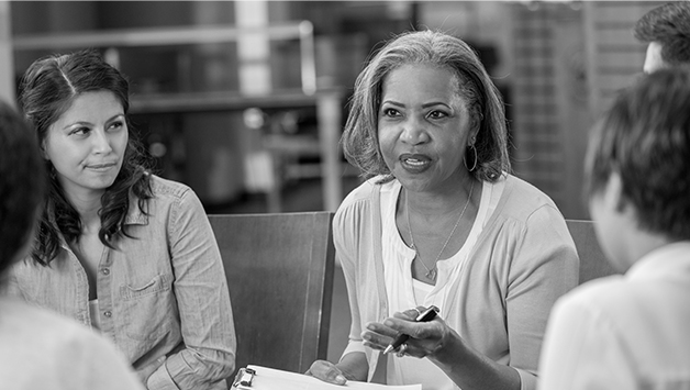 woman leading grief counseling session